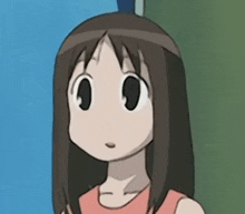 a close up of a cartoon girl 's face with long brown hair .