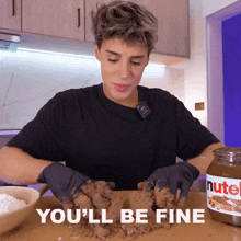 a man is making a cookie dough next to a jar of nutella that says " you 'll be fine "