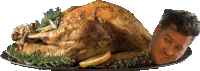 a roasted turkey with a man 's face on it