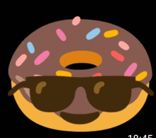 a donut with sunglasses and sprinkles on it 's face