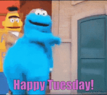 bert and cookie monster from sesame street are dancing together and saying happy tuesday .