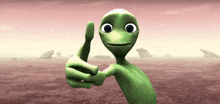 a green cartoon character giving a thumbs up sign