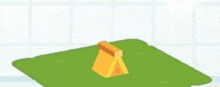 a yellow tent is sitting on top of a green blanket .