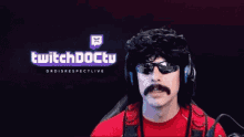 a man with a mustache wearing sunglasses and headphones is standing in front of a twitch logo .