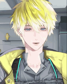 a man with yellow hair and blue eyes looks at the camera