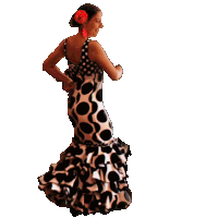 a woman in a polka dot dress is dancing