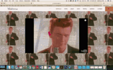 a computer screen shows a man in a suit and tie and the word mistress