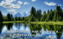 a picture of a lake with the words good morning may you have a peaceful day below it