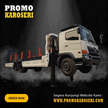 a white truck with the words promo karoseri on the top