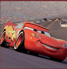 lightning mcqueen from the movie cars is driving down the track