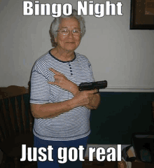 an elderly woman holding a gun with bingo night just got real written below her