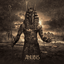 a poster of anubis holding a scale in front of the pyramids