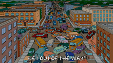 an aerial view of a busy city street with the words get out of the way on the bottom