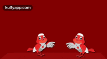 a couple of birds sitting next to each other on a red background with the word happy in white letters