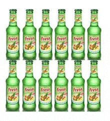 a row of green bottles of fresa ginger ale on a white background .