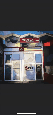 a store front with mesnica and stef written on it