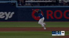 a baseball game is being played in front of a sn advertisement