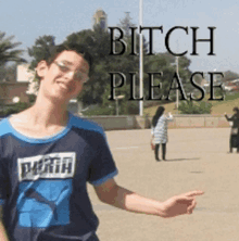 a young man wearing a blue shirt that says perth on it