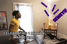 a man in a yellow shirt stands in a bedroom celebrating 1 million marketcap