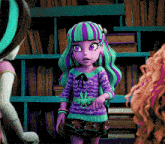 a girl with green and purple hair is wearing a purple and green sweater