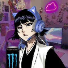 a girl wearing headphones stands next to a monster can