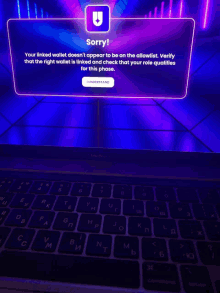 a laptop with a screen that says sorry your linked wallet does n't appear to be on the allowed list