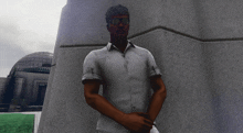 a man in a white shirt and sunglasses is standing in front of a building