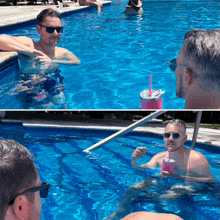 two men are swimming in a pool and one is holding a pink drink