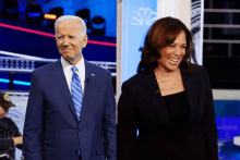 a man in a suit and tie stands next to a woman