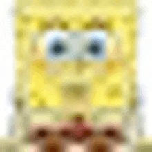 a close up of a spongebob squarepants cartoon character 's face with blue eyes .