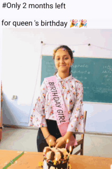 a girl with a sash that says birthday girl