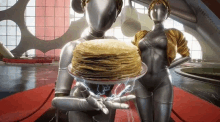 a robot is holding a plate of pancakes next to another robot .