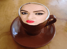 a cup of coffee with a picture of a woman 's face in it