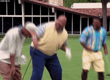 three men are dancing on a golf course and one of them is holding a golf club in his hand