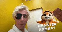 a man with a bandage on his eye is standing next to a hamster costume