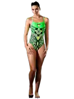 a woman in a green swimsuit is standing on a white surface