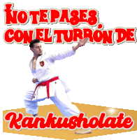 a man in a white karate uniform with a red belt stands in a karate pose