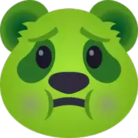 a green panda bear with a sad face on its face