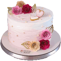 a cake with pink roses and gold leaves is sitting on a plate that says bola de ma