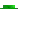 a green top hat is sitting on a white surface .