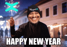 a man wearing a blizzard hat is holding a sparkler