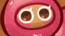 a close up of a pink cookie with white eyes in a cookie run game .