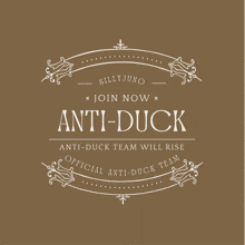 a sign that says silly juno join now anti-duck anti-duck team will rise official anti-duck team