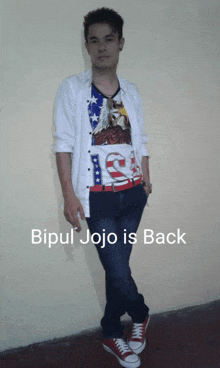 a man wearing a shirt that says ' bipul jojo is back '