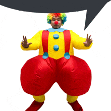 a man in an inflatable clown costume with a speech bubble above his head