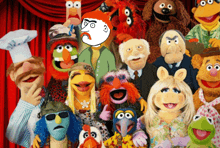 a group of muppets posing for a picture with a chef hat on