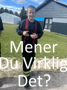 a boy wearing a black shirt and red suspenders is standing in front of a building with the words mener du viktig det