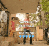 a man is dancing in front of a building with the words sapphire emerald diamond