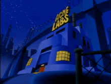 a blue building with the words acme labs on the top