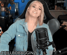 a woman sitting in front of a microphone that says chillbobagginz on the bottom